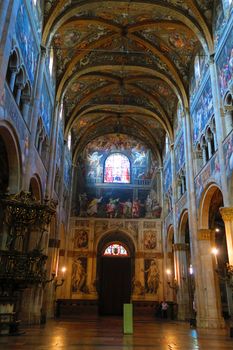 Parma,Italy, 25 september 2015.Internal facade and central nave of the cathedral in Parma, Italy, one of the finest examples of Romanesque architecture consecrated in 1106. The large fresco is the ascension of Christ and was painted by Lattanzio Gambara between 1571 and 1573