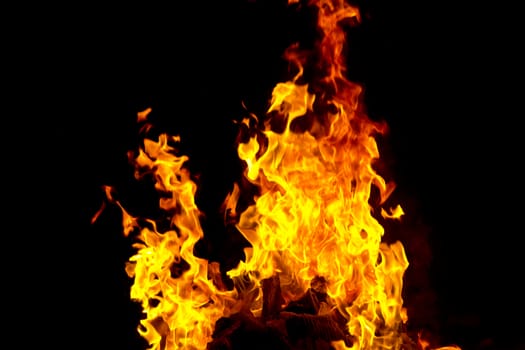 Photo of red fire flame on black background
