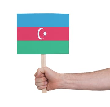 Hand holding small card, isolated on white - Flag of Azerbaijan