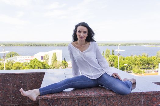 Photo of young woman in pose twine