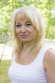 European blond woman with long hair and blue eyes