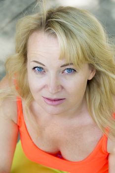 European blond woman with long hair and blue eyes