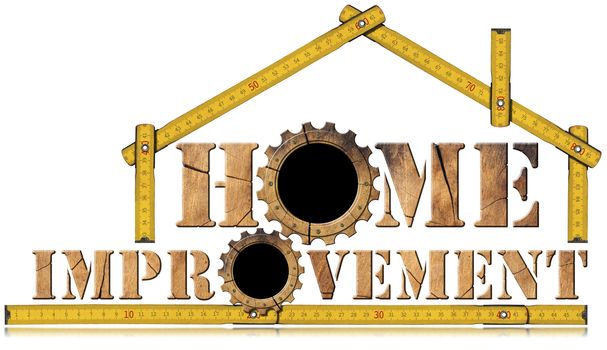 Wooden symbol with text Home Improvement, wooden gears and wooden meter ruler in the shape of house. Isolated on white background