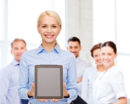 business, technology, internet and advertisement concept - smiling businesswoman with blank black tablet pc computer screen