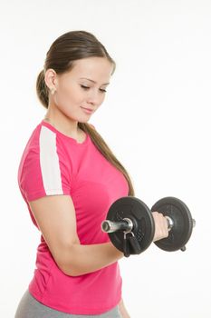 Young beautiful girl athlete Europeans conducting physical training