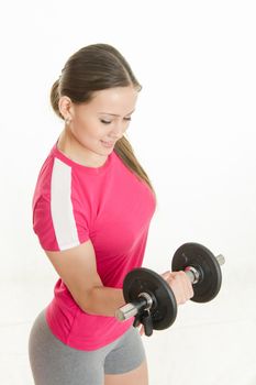 Young beautiful girl athlete Europeans conducting physical training