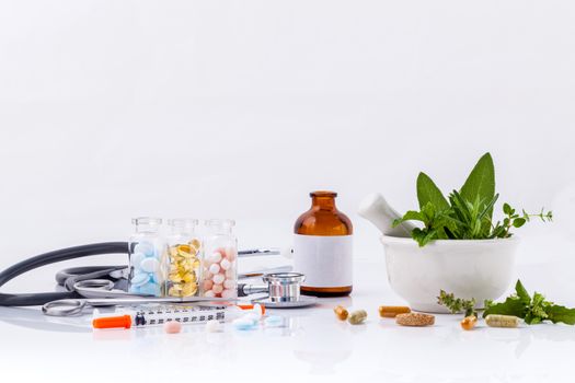 Herbal medicine VS Chemical medicine the alternative healthy care with stethoscope isolate on white background.