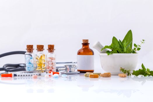 Herbal medicine VS Chemical medicine the alternative healthy care with stethoscope isolate on white background.