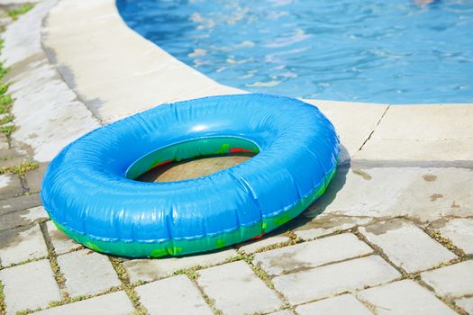 Life ring at the swimming pool. Horizontal photo