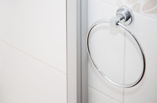 Towel holder in bathroom. Close-up horizontal photo