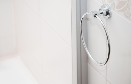 Towel holder in bathroom. Close-up horizontal photo
