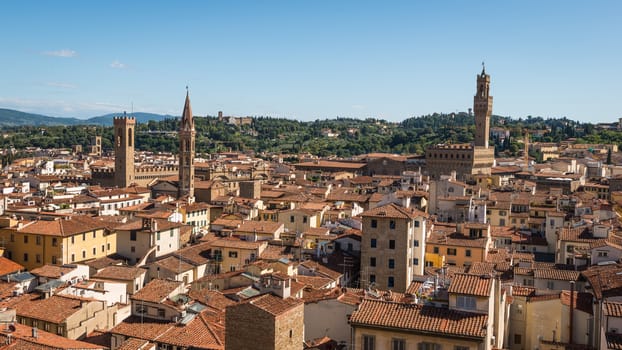 In the picture an aerial view of the old town of Florence