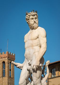 Close-up at Statue of Neptune with tower in background, Piazza della Signoria, Florence (Italy)