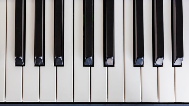 Piano Keyboard synthesizer closeup key top view