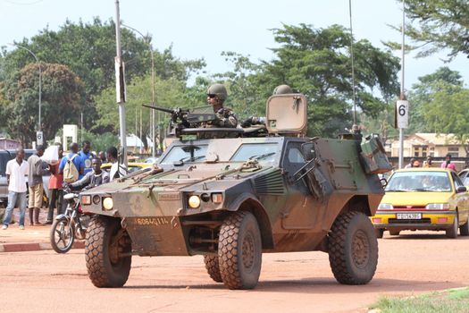 CENTRAL AFRICAN REPUBLIC, One vehicle of the French Sangaris armed force passes on a street in Bangui, as it patrols in the city, on October 2, 2015. The Central African Republic descended into bloodshed more than two years ago after long time president Francois Bozize, a Christian, was ousted by Seleka rebels, triggering the worst crisis since independence in 1960. On September 29, 2015, Bangui returned to only relative calm after three days of inter-community violence which left at least 40 dead and 100 injured according to the UN Refugee Agency UNHCR. Some 27,000 inhabitants of Bangui have also fled to displaced people's camps.