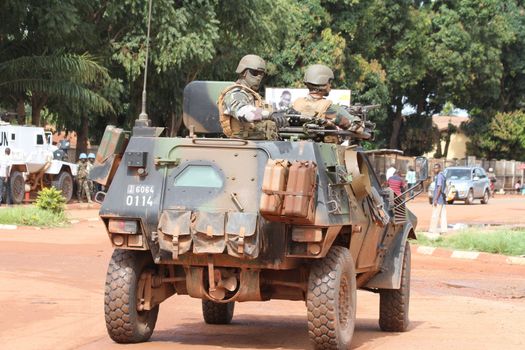 CENTRAL AFRICAN REPUBLIC, One vehicle of the French Sangaris armed force passes on a street in Bangui, as it patrols in the city, on October 2, 2015. The Central African Republic descended into bloodshed more than two years ago after long time president Francois Bozize, a Christian, was ousted by Seleka rebels, triggering the worst crisis since independence in 1960. On September 29, 2015, Bangui returned to only relative calm after three days of inter-community violence which left at least 40 dead and 100 injured according to the UN Refugee Agency UNHCR. Some 27,000 inhabitants of Bangui have also fled to displaced people's camps.