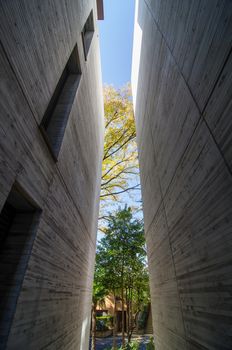 Vertical void between a stone wall. Modern architecture