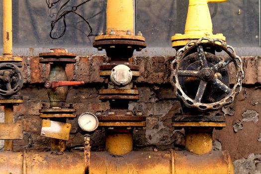 Closeup shot of big rusted valve industrial site