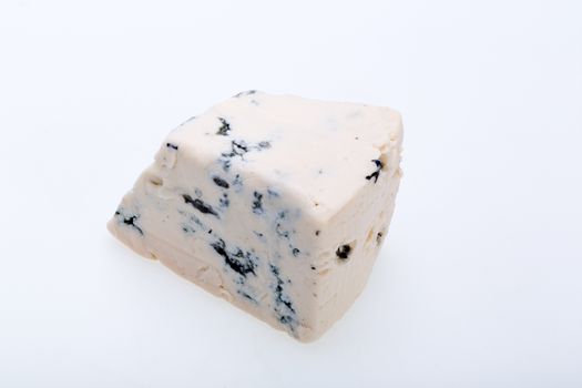piece of blue cheese on white background 