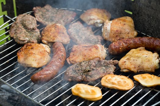 barbecue with delicious grilled meat on grill 