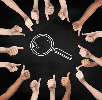 gesture, people and exploration concept - human hands showing thumbs up in circle over black board background with magnifier