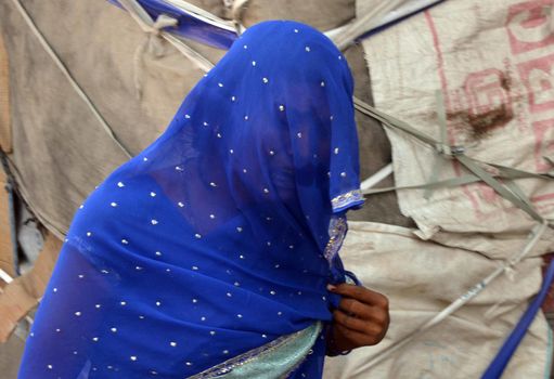 INDIA, Allahabad: A family member mourns after an explosion at a firecracker factory on October 6, 2015 caused two houses to collapse, killing two people and critically injuring three others.  According to our contributor on the ground, the firecracker factory was operating illegally.