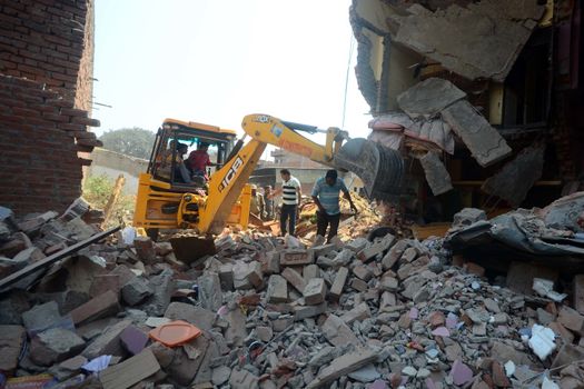 INDIA, Allahabad: Police conduct rescue work, trying to save or recover anyone in the debris of two houses which collapsed on October 6, 2015, after an explosion at a firecracker factory. According to our contributor on the ground, the firecracker factory was operating illegally.