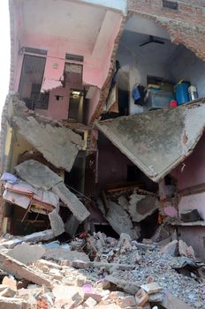 INDIA, Allahabad: A view of two houses which collapsed due to an explosive blast at a firecracker factory on October 6, 2015. According to our contributor on the ground, the firecracker factory was operating illegally.
