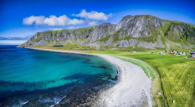 Scenic aerial panorama of beach in Unstad, one of the best beaches on Lofoten islands in Norway, famous surfing spot