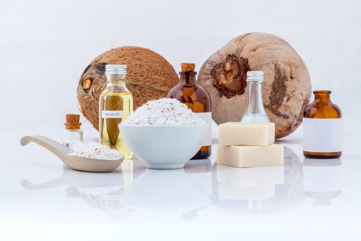 Coconut essential Oils natural Spa Ingredients for scrub ,massage and skin care isolate on white background.