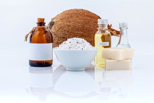 Coconut essential Oils natural Spa Ingredients for scrub ,massage and skin care isolate on white background.