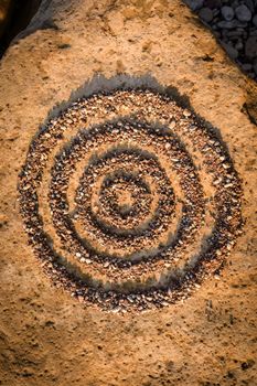 Zen meditation of rock garden concept. Concentric circles of small stones