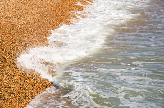 Waves on shingle