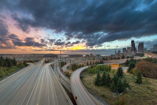 Colorful Sunset Over Seattle Washington City Skyline and Interstate Freeway