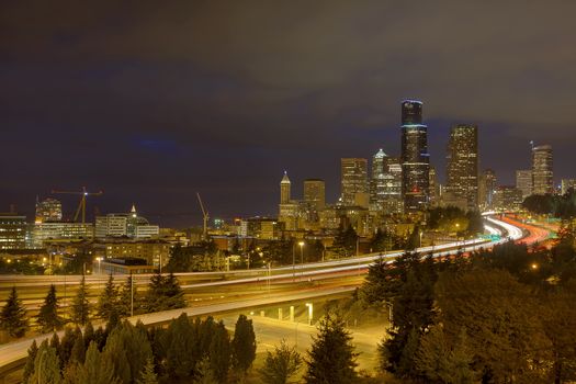 Seattle Washington Downtown City Skyline with Freeway Traffic Light Trails During Evening Blue Hour