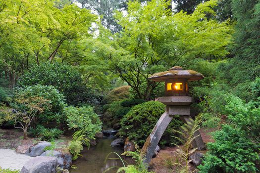 Stone Lantern Lit with Candles at Portland Japanese Garden in the Evening