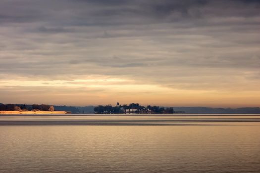 German lake Chiemsee, Bavaria with its famous island Herrenchiemsee in twilight