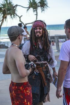 GOLD COAST - FEB 19: An unidentified man poses as Jack Sparrow from Pirates of the Caribbean movie franchise at an informal Weekend Market Feb.19, 2012 in Gold Coast Australia.