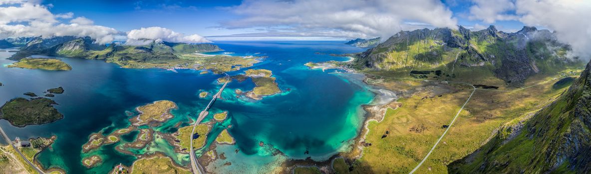 Scenic aerial panorama of Lofoten islands in Norway with beautiful mountains and road bridges connecting islands