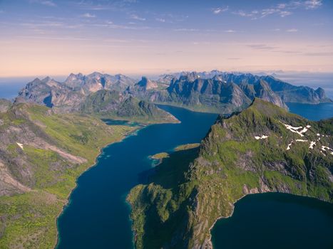 Breathtaking aerial view of Lofoten islands in Norway with their deep fjords and dramatic peaks