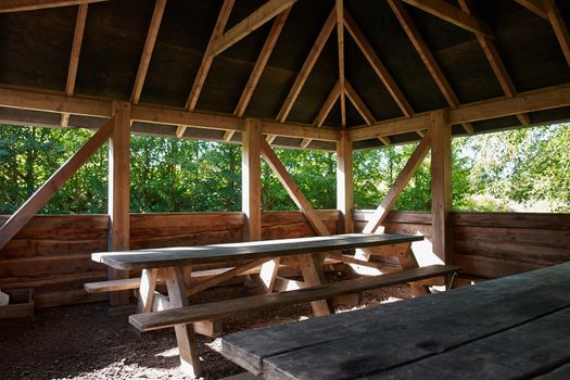 Rustic style Picnic Table made of wood in a camping site