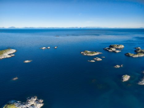 Scenic view of tiny islets on the coast of norway seen from air