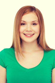 happiness and people concept - smiling teenage girl in casual clothes