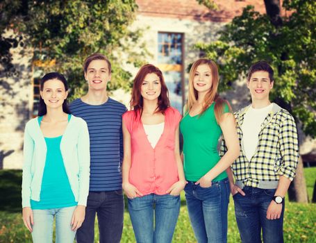 education and people concept - group of smiling students standing