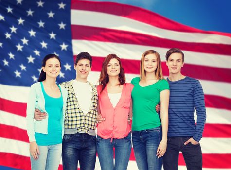 education and people concept - group of smiling students standing