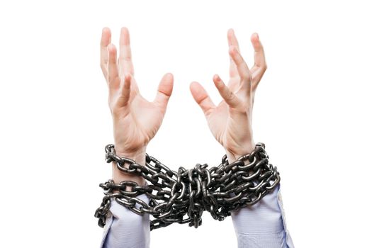 Business problems and failure at work concept - businessman with metal chain knot tied hands raised up for rescue help white isolated