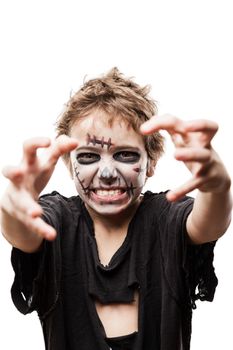 Halloween or horror concept - screaming walking dead zombie child boy reaching hand white isolated