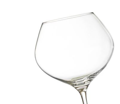empty white wine into a glass on white background with space for text