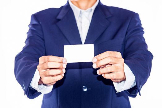 Man's hand showing business card - closeup shot on background