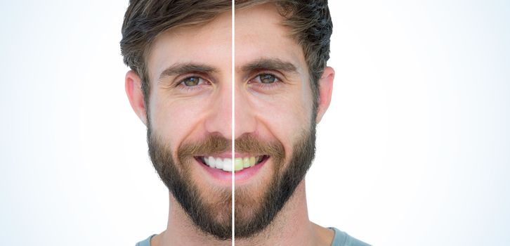 Happy handsome man looking at camera on white background